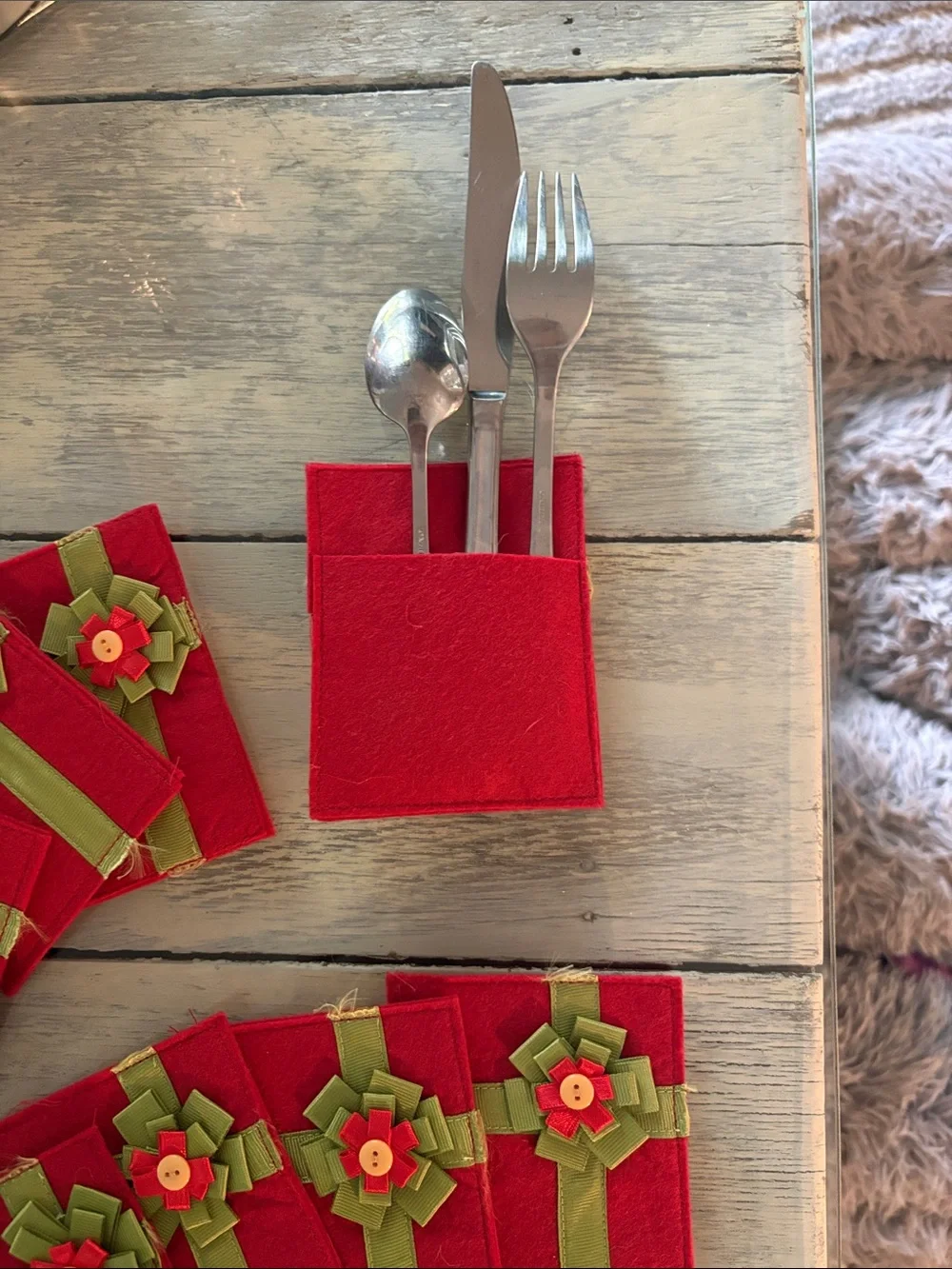8 Red Felt Utensil Holder with Green Ribbon Accent